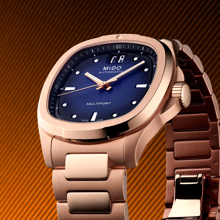 นาฬิกา Mido Multifort TV Big Date 2026 ตัวเรือน Rose Gold หน้าปัดสีน้ำเงิน สวมใส่โดย อีจงซอก