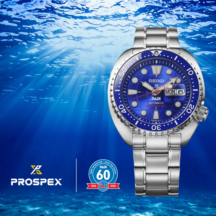 Seiko Prospex PADI 60th Anniversary Limited Edition (HBB002) ความพิเศษฉลอง 60 ปี PADI นาฬิกาดำน้ำ Seiko Prospex PADI 60th Anniversary Limited Edition รหัส HBB002 ตัวเรือน King Turtle หน้าปัดลายลูกโลกสีน้ำเงินตัดขอบแดง