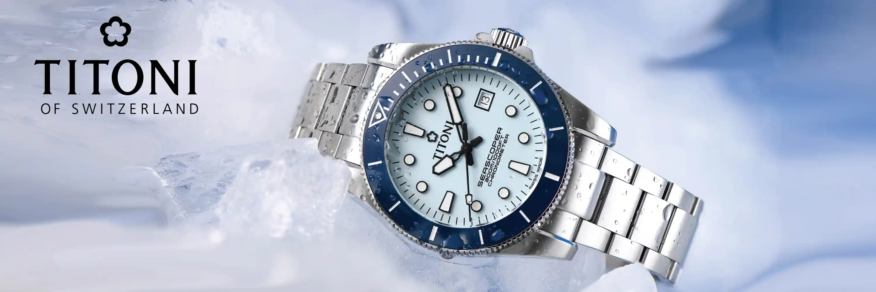 นาฬิกา TITONI Seascoper หน้าปัดสีขาว ขอบเซรามิกสีน้ำเงิน นาฬิกาดำน้ำสวิสแท้ (Swiss Made) วางบนน้ำแข็ง