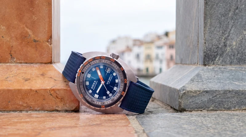 Doxa SUB300Ti5 ขยายทางเลือกสู่ตัวเรือนไทเทเนียม เกรด 5 นาฬิกาดำน้ำ Doxa SUB300Ti5 ตัวเรือนไทเทเนียม เกรด 5 หน้าปัดสีส้ม Professional สายยาง Dive Flex