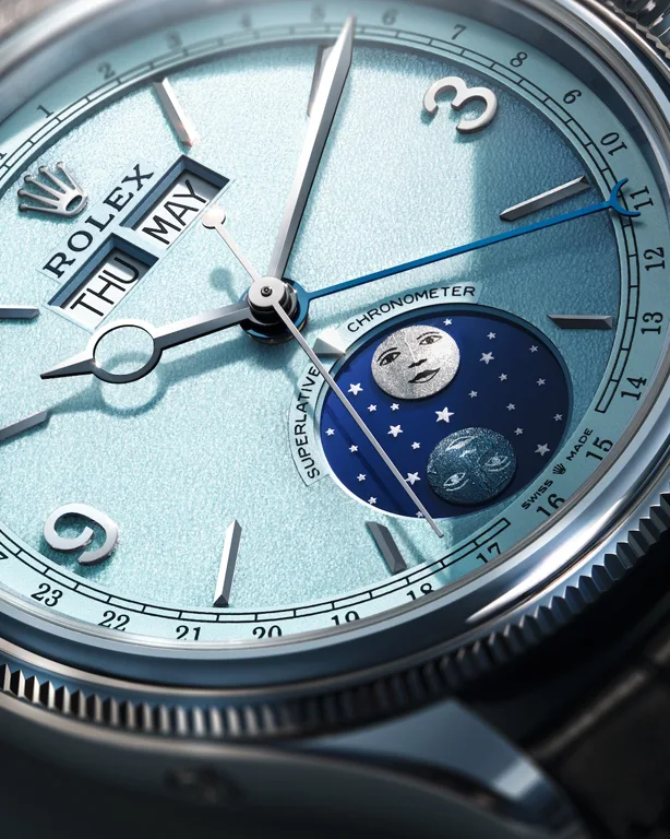 หน้าปัด Ice Blue Rolex Perpetual Padellone หน้าต่างวัน-เดือน เข็มวันที่สีน้ำเงิน และ Moonphase